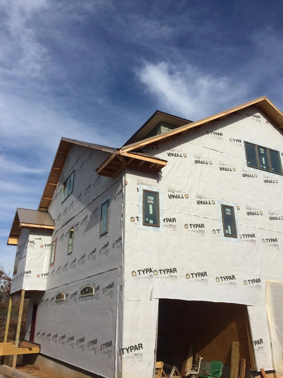 Stick built house wrapped in Typar with new roof framing and dormers in Smithville